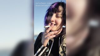 Alternative Girl Smoking Cigarettes on the Beach