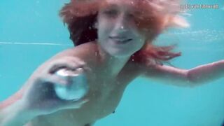 Sexy underwater redhead Nikita Vodorezova