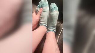 Rubbing Feet and taking off Socks