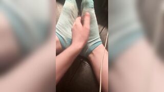 Rubbing Feet and taking off Socks