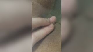 I love to masturbate my big clit in a hot tub