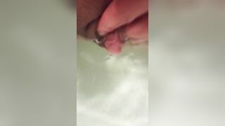 I masturbate underwater in the bathroom with a beautiful erect clitoris