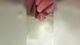 I masturbate underwater in the bathroom with a beautiful erect clitoris