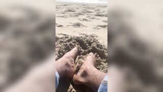 BIG FEET playing in the sand