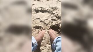 BIG FEET playing in the sand