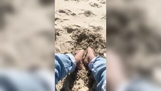 BIG FEET playing in the sand