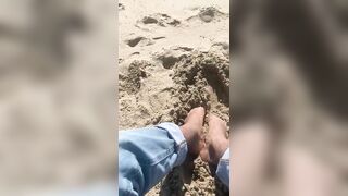 BIG FEET playing in the sand