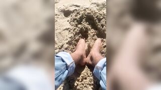 BIG FEET playing in the sand