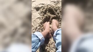 BIG FEET playing in the sand