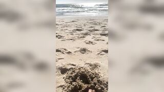 BIG FEET playing in the sand