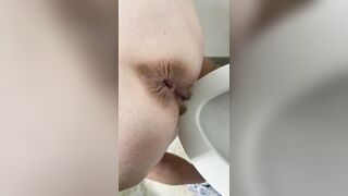 Mature peeing in toilet and shower