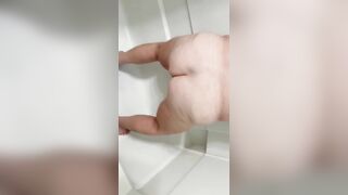 Mature peeing in toilet and shower