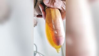 French guy PISS in a condom and spills it all over his cock (vocal)