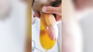 French guy PISS in a condom and spills it all over his cock (vocal)