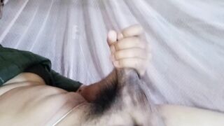 Man jerking off in bed until cumming