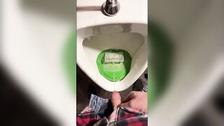 Pissing into a urinal in a pub. I play football with urine