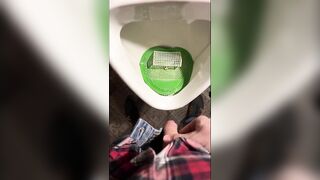 Pissing into a urinal in a pub. I play football with urine