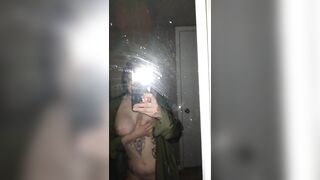 Whore playing with big tits in dirty mirror