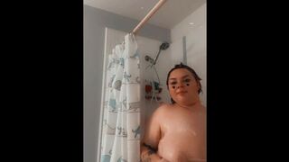 Rubbing huge tits in the shower