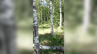 Masturbating on the tree using dry twig. Hairy cunt in the forest