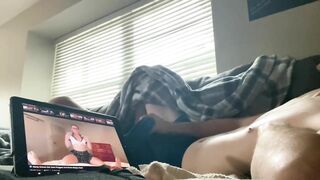 Watching porn in the living room while everyone upstairs huge cum in shorts WATCH END