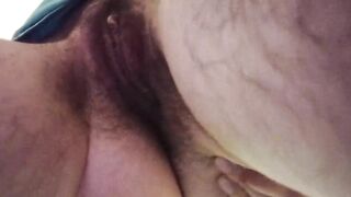 Masturbation on bathroom mat. Big hairy pussy fingering.