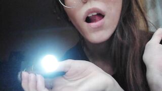 Giantess plays with a tiny in her mouth before swallowing it