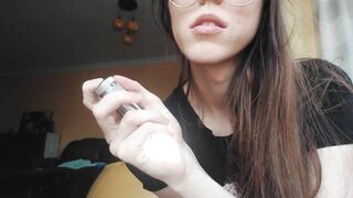 Giantess plays with a tiny in her mouth before swallowing it