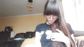 Giantess plays with a tiny in her mouth before swallowing it