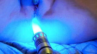 Nerdy chick cums hard on lightsaber