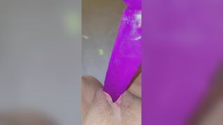 Putting my purple dildo deep inside my hungry pussy