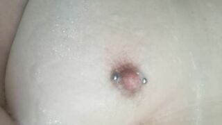 Nipple play in the bath...