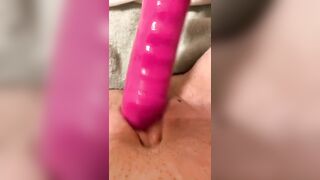 squirting on pink dildo