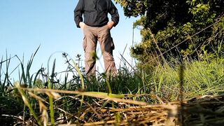 Mother-in-law in a new dress bends over and pisses in nature with her son-in-law