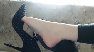 Admire my feet as I dangle my high heels